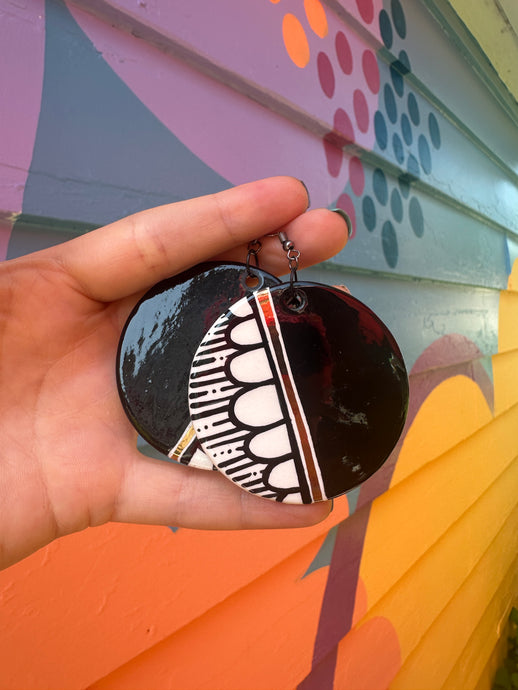 Large black, white and gold earrings