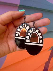 Medium black, white, and gold earrings