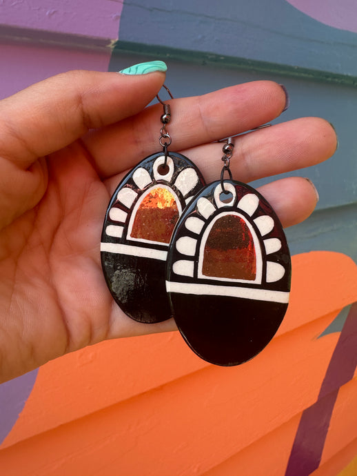 Medium black, white, and gold earrings